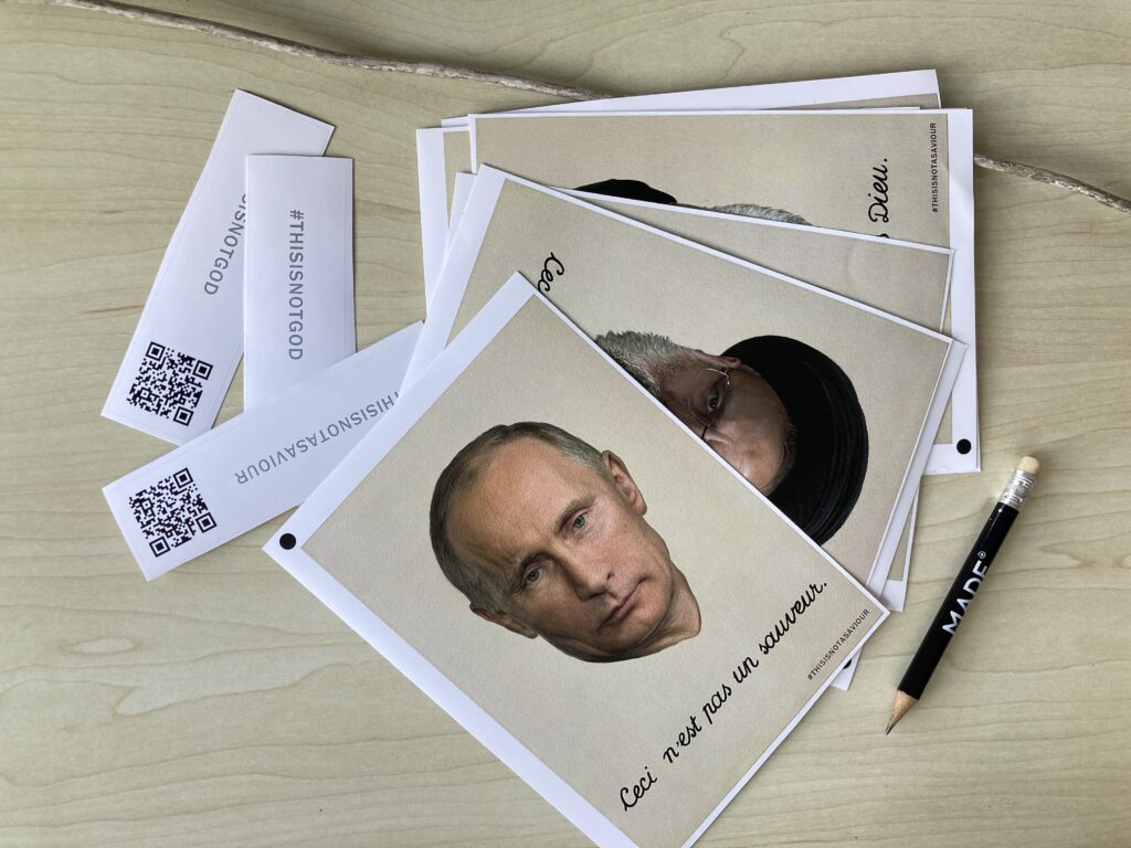 posters of Putin with the capiton: "This is not God" 