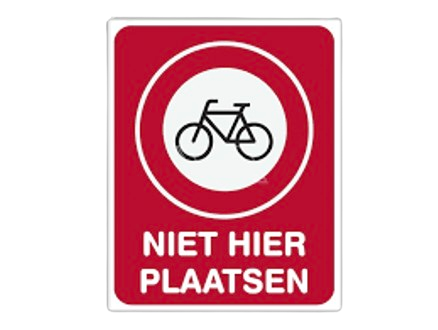 A bicycle road sign that reads: "Niet Hier Plaatsen".